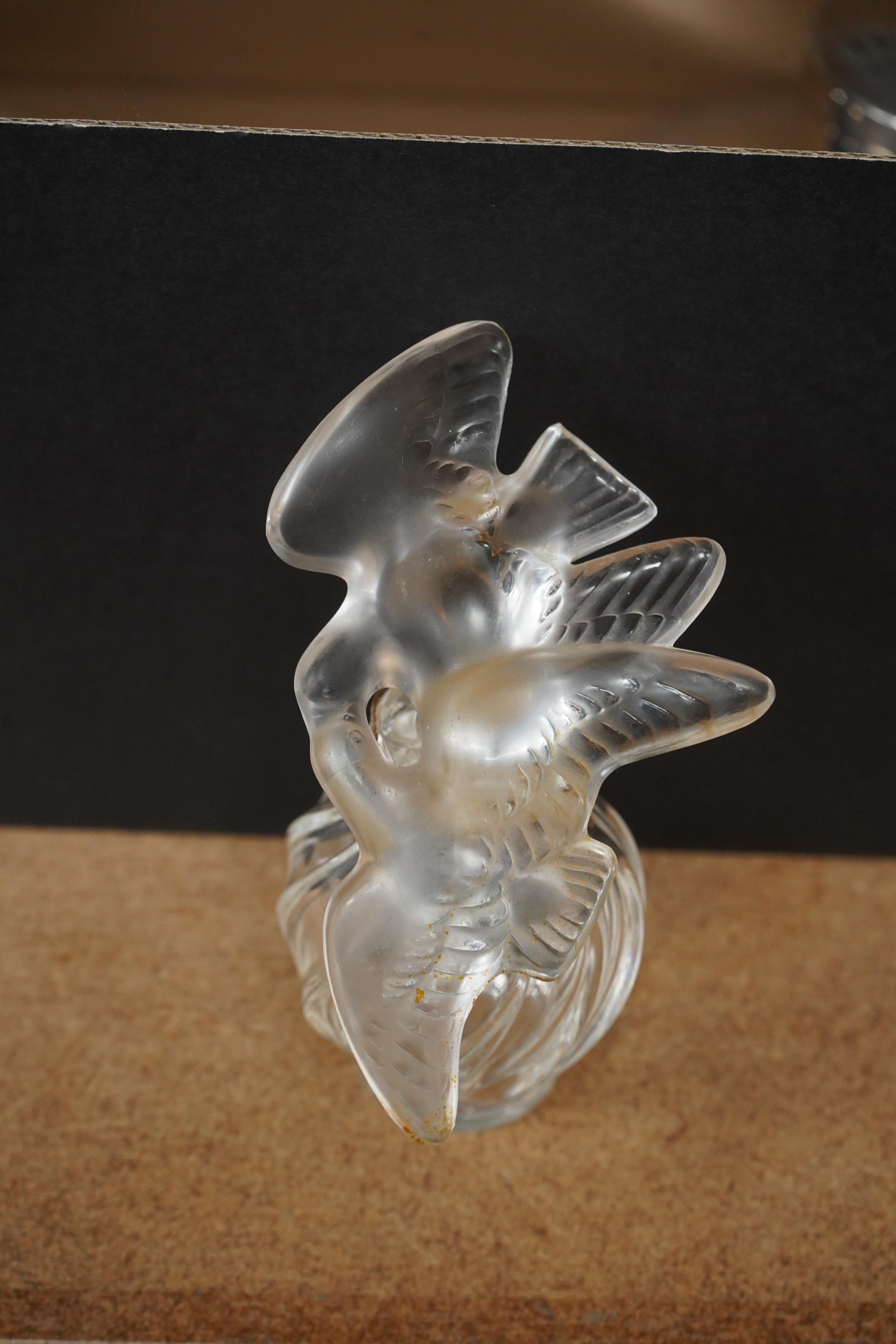 A Lalique scent bottle, Nina Ricci l'airs du temps, 10.5cm tall